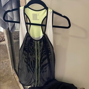Lucky in Love Tennis set.  Mesh tank and matching skirt.